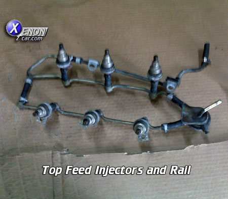 Top Feed Fuel Injectors